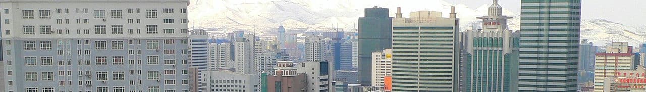 Urumqi skyline and mountains used for Xinjiang gateway planning
