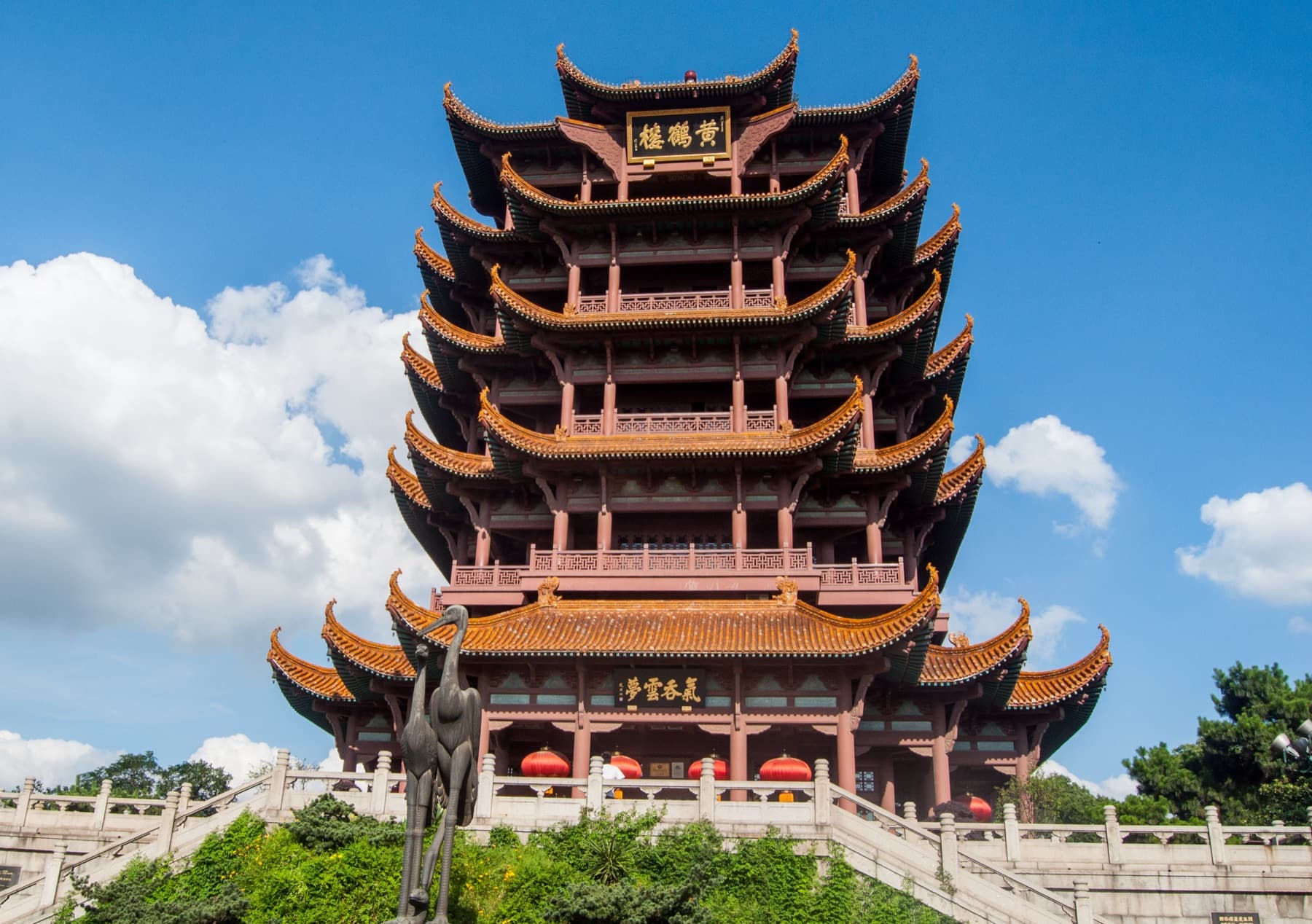 Yellow Crane Tower in Wuhan above trees and city buildings